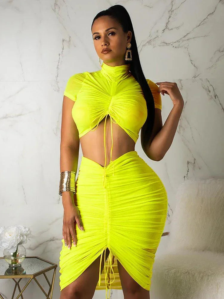 IMIEMIE Neon Green Yellow Sexy Two Piece Set Women Turtleneck Short Sleeve Crop Top+ Pleated Bodycon Dress Tracksuit 2 Piece Club Outfit