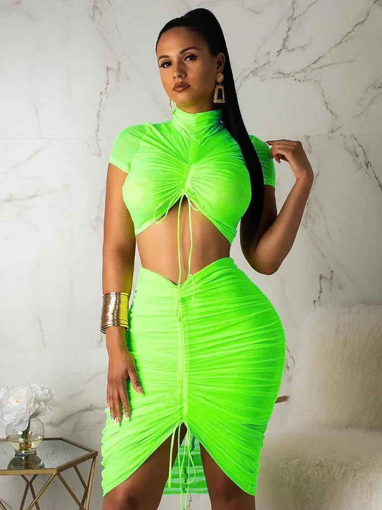 IMIEMIE Neon Green Yellow Sexy Two Piece Set Women Turtleneck Short Sleeve Crop Top+ Pleated Bodycon Dress Tracksuit 2 Piece Club Outfit